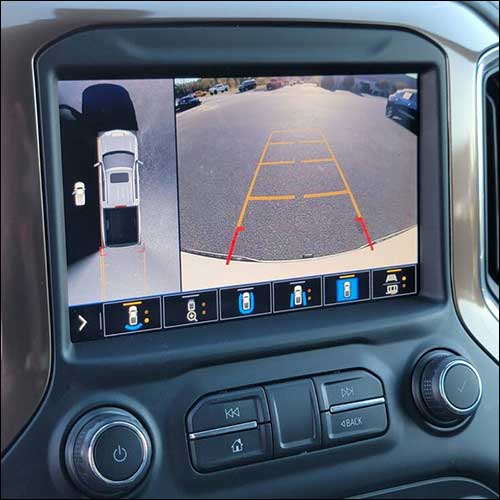 An image of the in-dash monitor of GMC Sierra HD truck with 360-degree surround view camera system