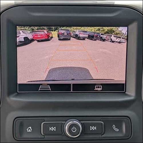 An image of the in-dash monitor of GMC Sierra HD truck with standard backup camera